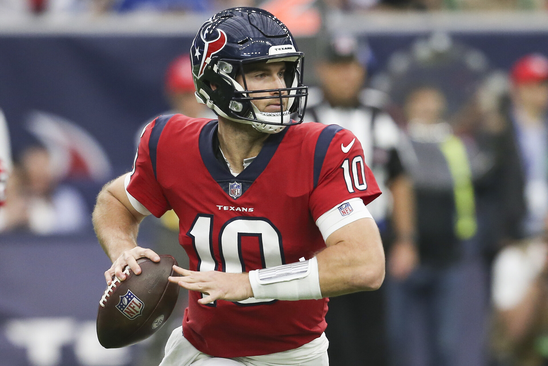 Houston Texans quarterback Davis Mills (10) scrambles against the Indianapolis Colts in the second half at NRG Stadium.