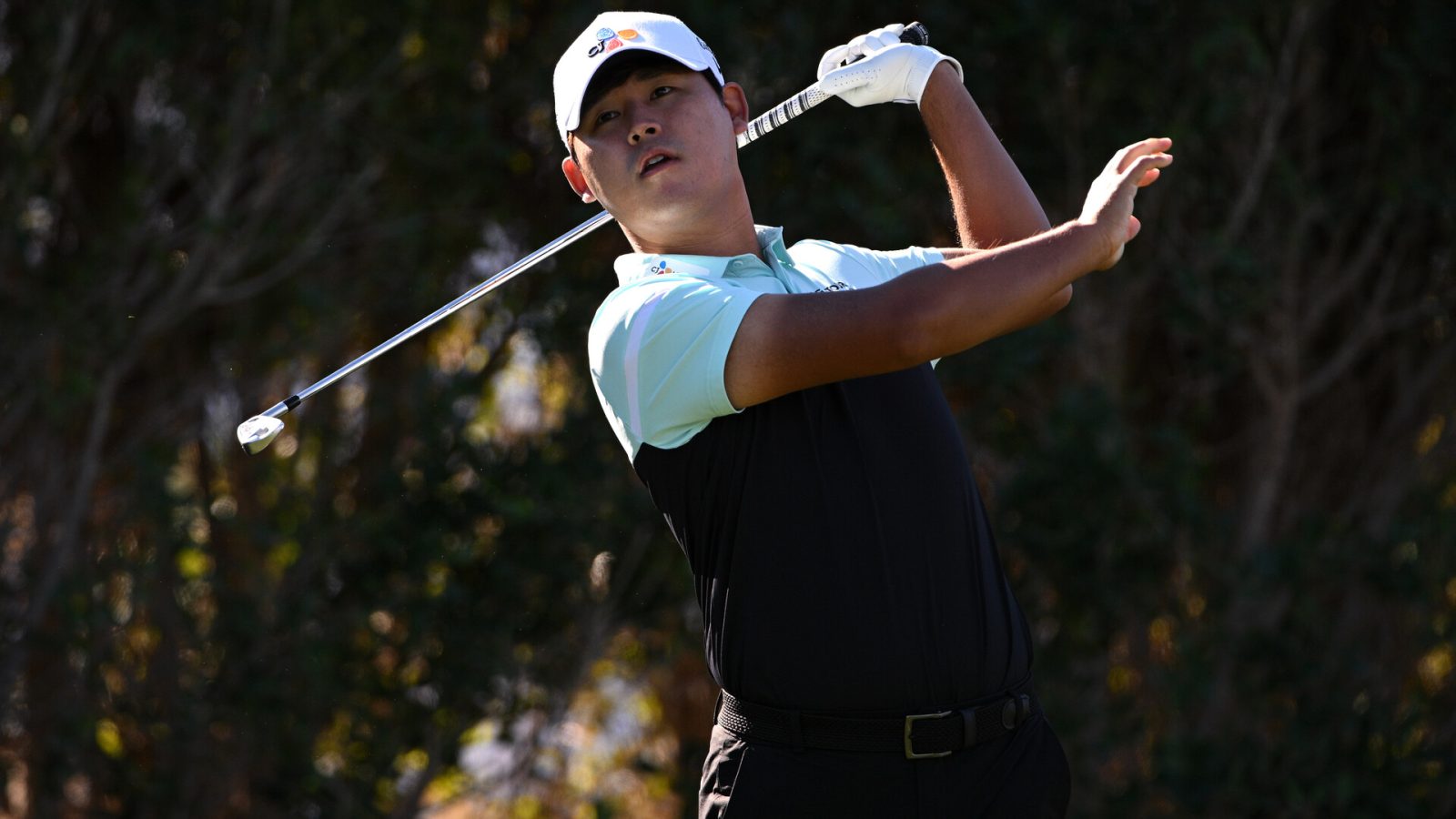Si Woo Kim plays his shot from the third tee during the first round of the American Express golf tournament at La Quinta Country Club