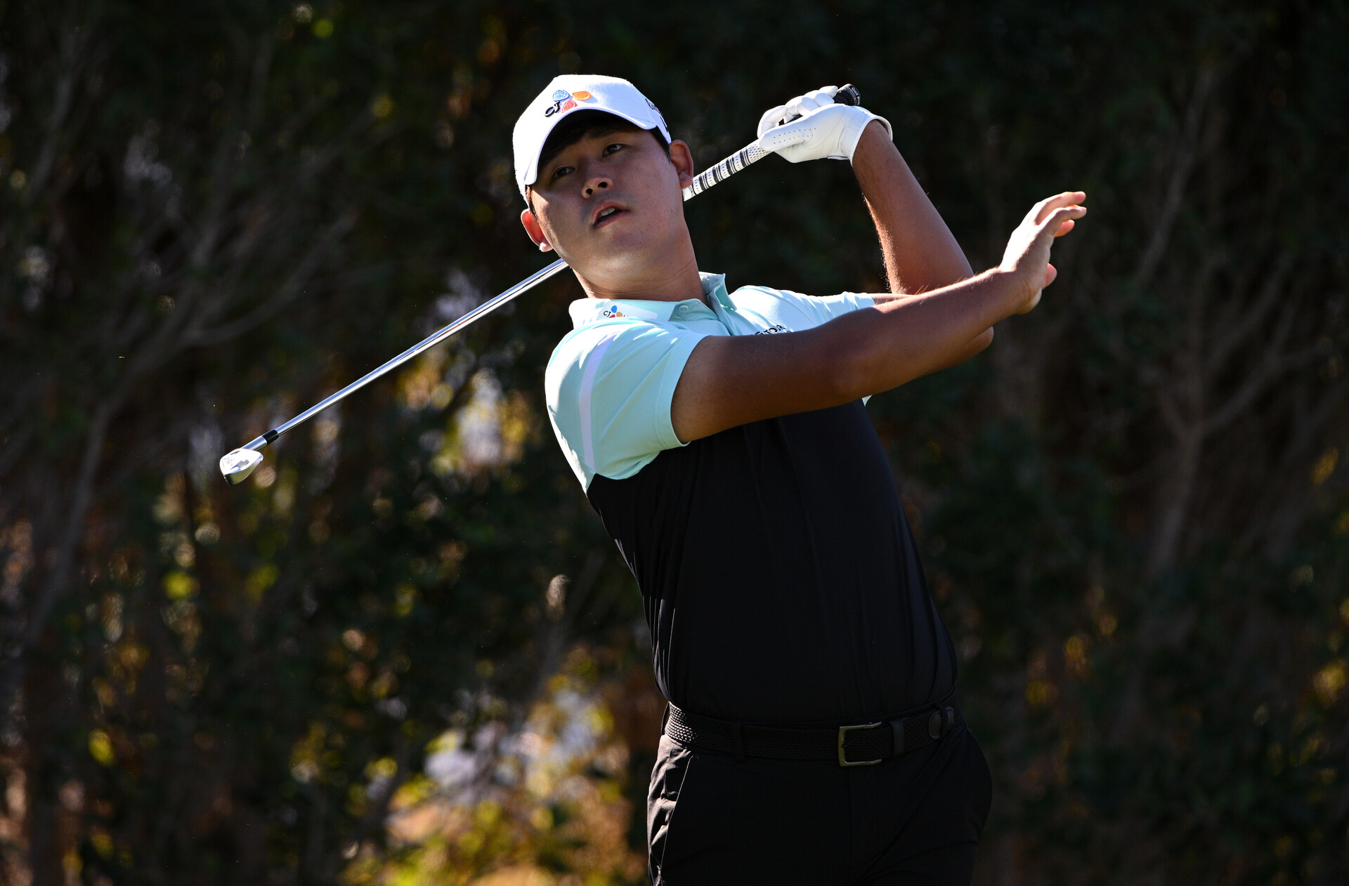 Si Woo Kim plays his shot from the third tee during the first round of the American Express golf tournament at La Quinta Country Club