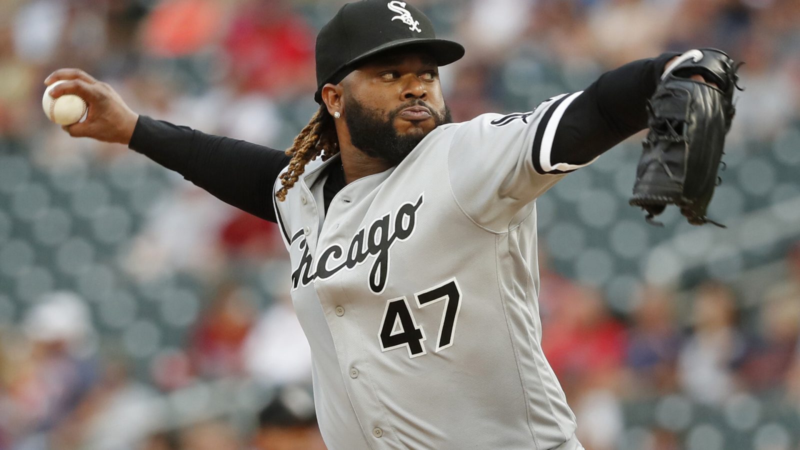 Chicago White Sox starting pitcher Johnny Cueto (47) throws to the Minnesota Twins in the first inning at Target Field.