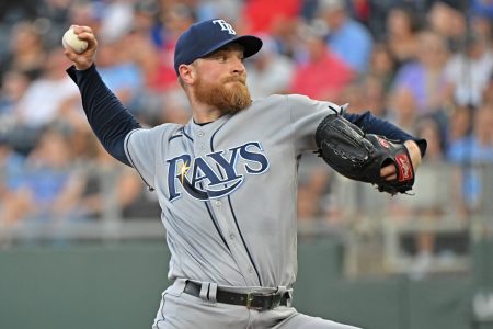 Tampa Bay Rays starting pitcher Drew Rasmussen (57) delivers a pitch during the first inning against the Kansas City Royals at Kauffman Stadium.