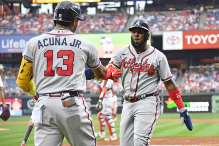 Jul 25, 2022; Philadelphia, Pennsylvania, USA; Atlanta Braves designated hitter Marcell Ozuna (20) celebrates with right fielder Ronald Acuna Jr. (13) after scoring against the Philadelphia Phillies during the second inning at Citizens Bank Park.