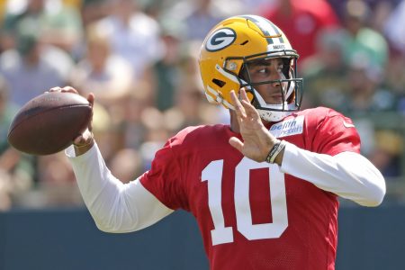 Green Bay Packers quarterback Jordan Love (10) throws a pass during training camp at Ray Nitschke Field.