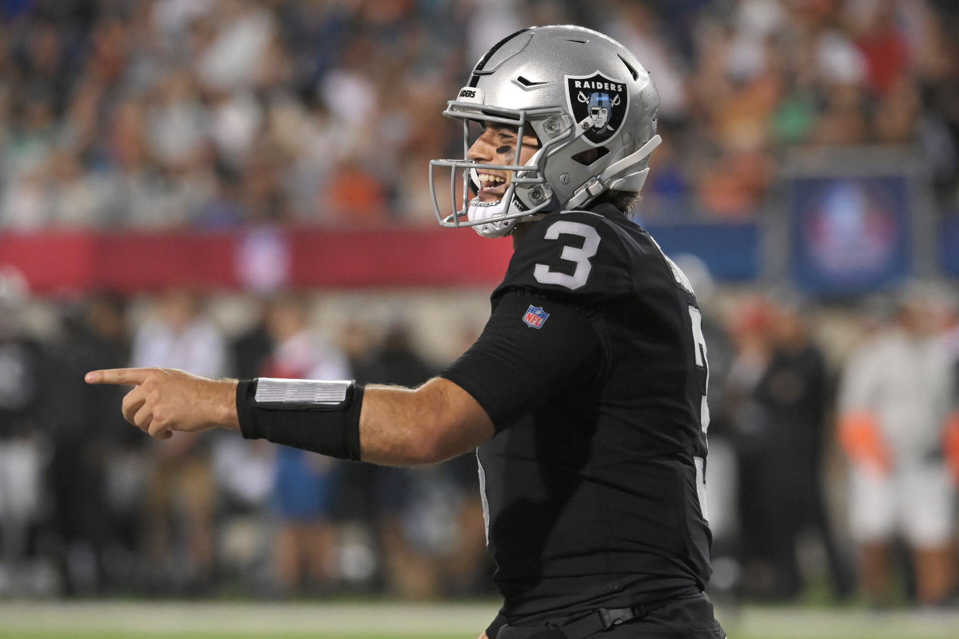 Las Vegas Raiders quarterback Jarrett Stidham (3) celebrates after scoring a touchdown during the second quarter against the Jacksonville Jaguars at Tom Benson Hall of Fame Stadium.