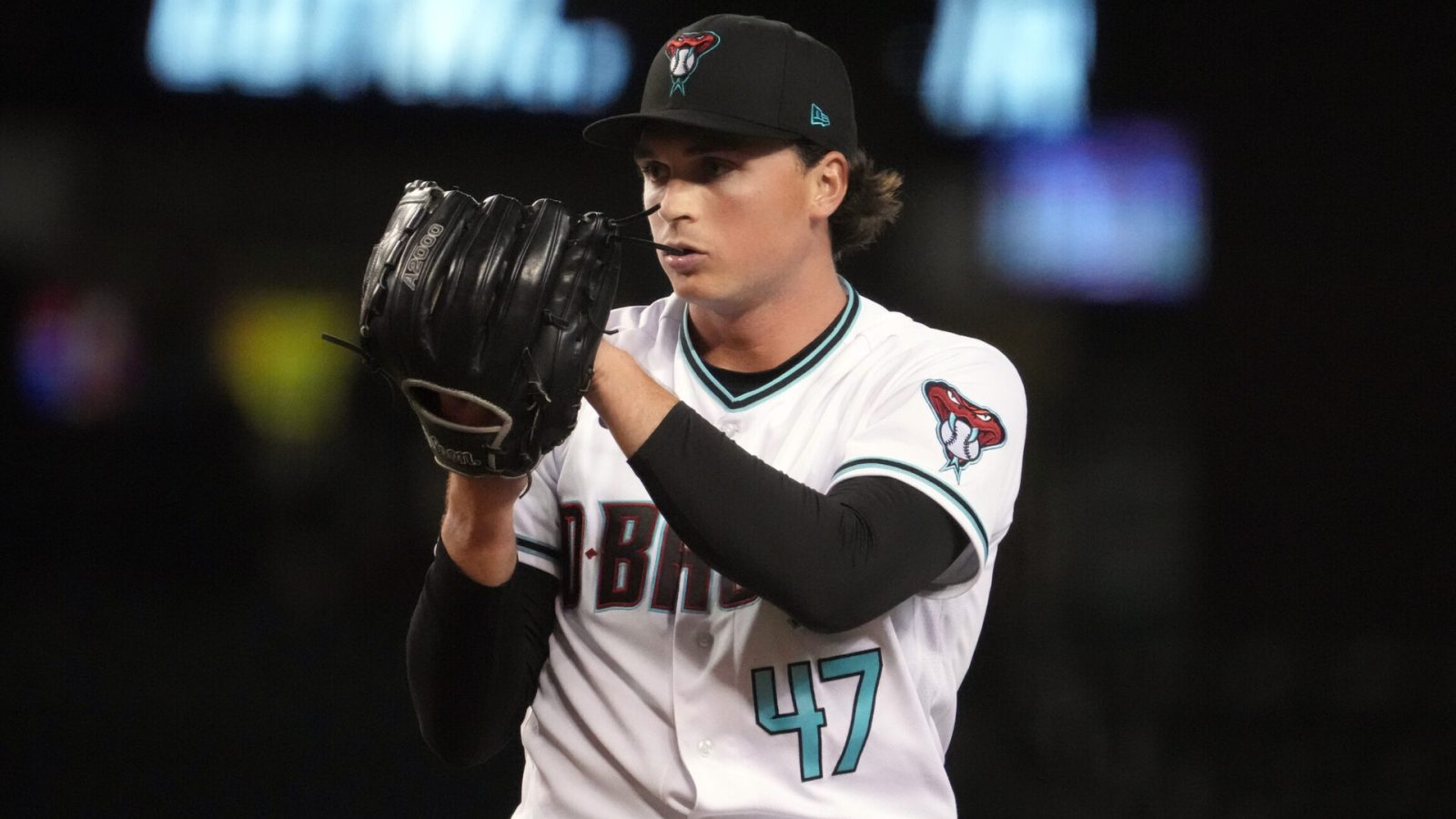 Aug 9, 2022; Phoenix, Arizona, USA; Arizona Diamondbacks starting pitcher Tommy Henry (47) pitches against the Pittsburgh Pirates during the first inning at Chase Field.