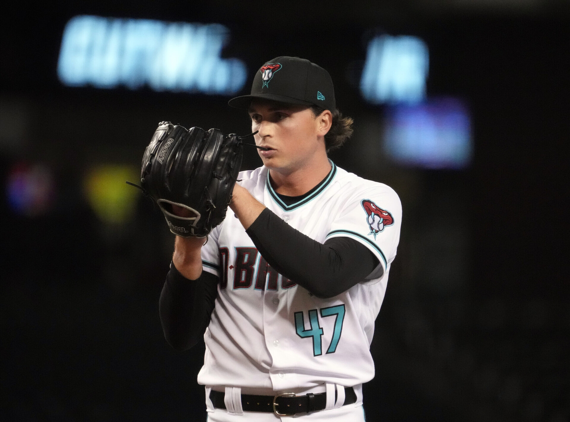 Aug 9, 2022; Phoenix, Arizona, USA; Arizona Diamondbacks starting pitcher Tommy Henry (47) pitches against the Pittsburgh Pirates during the first inning at Chase Field.