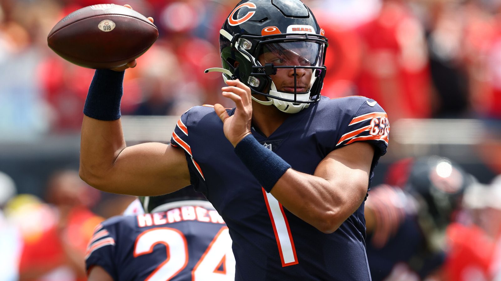 Chicago Bears quarterback Justin Fields (1) drops back to pass against the Kansas City Chiefs during the first quarter at Soldier Field.