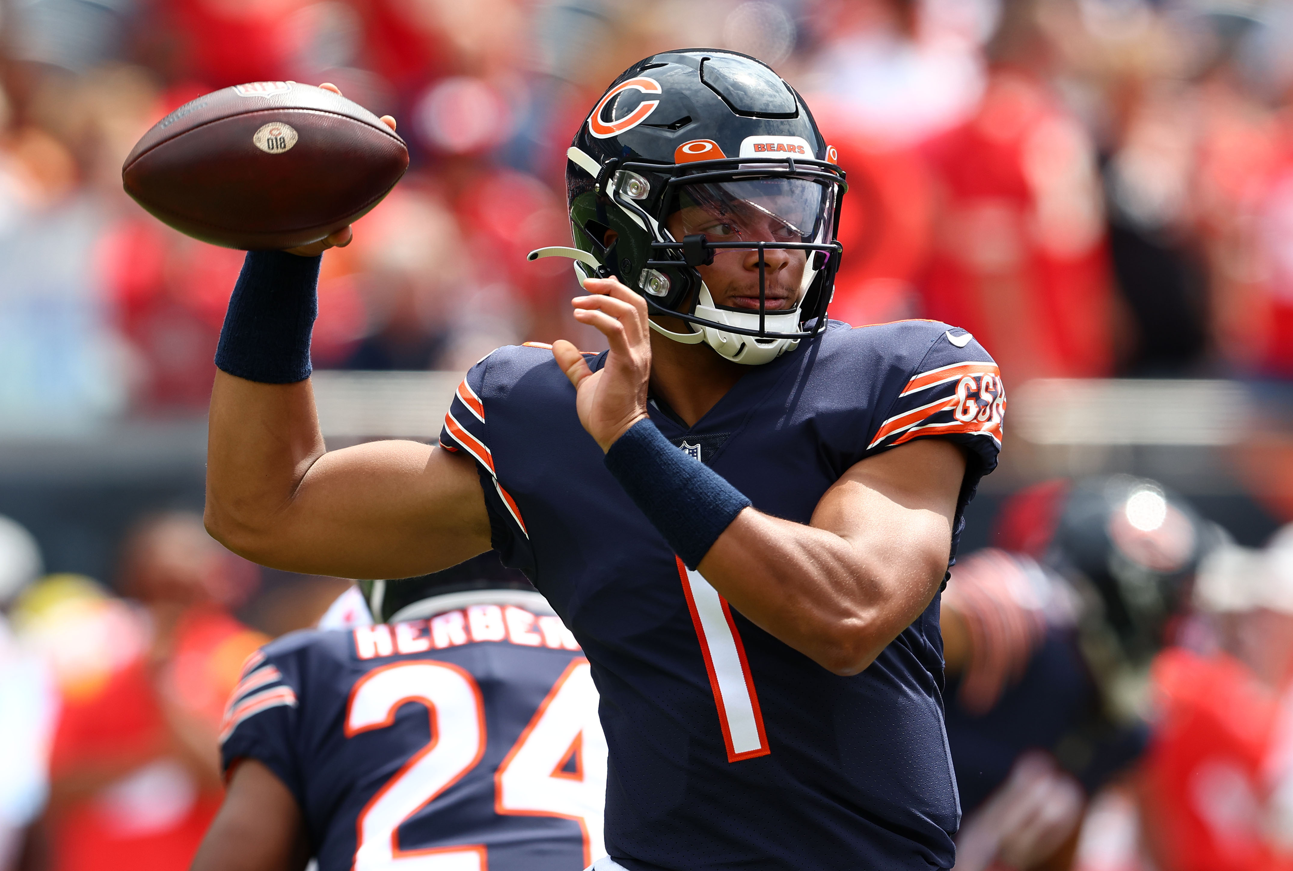 Chicago Bears quarterback Justin Fields (1) drops back to pass against the Kansas City Chiefs during the first quarter at Soldier Field.