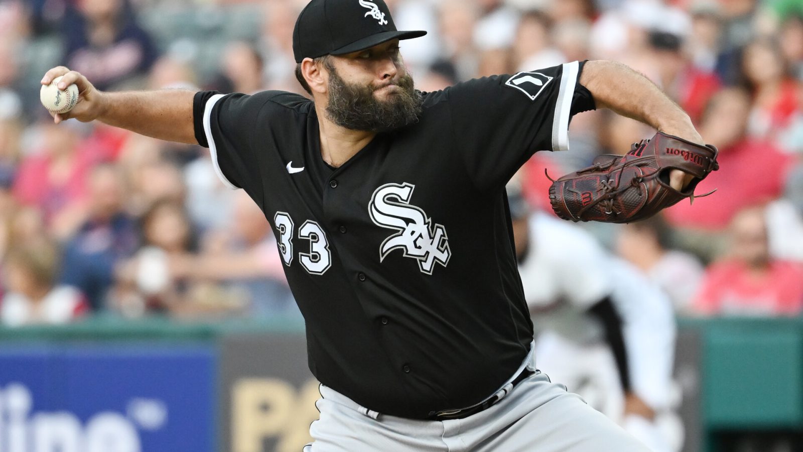 Aug 19, 2022; Cleveland, Ohio, USA; Chicago White Sox starting pitcher Lance Lynn (33) throws a pitch during the first inning against the Cleveland Guardians at Progressive Field.