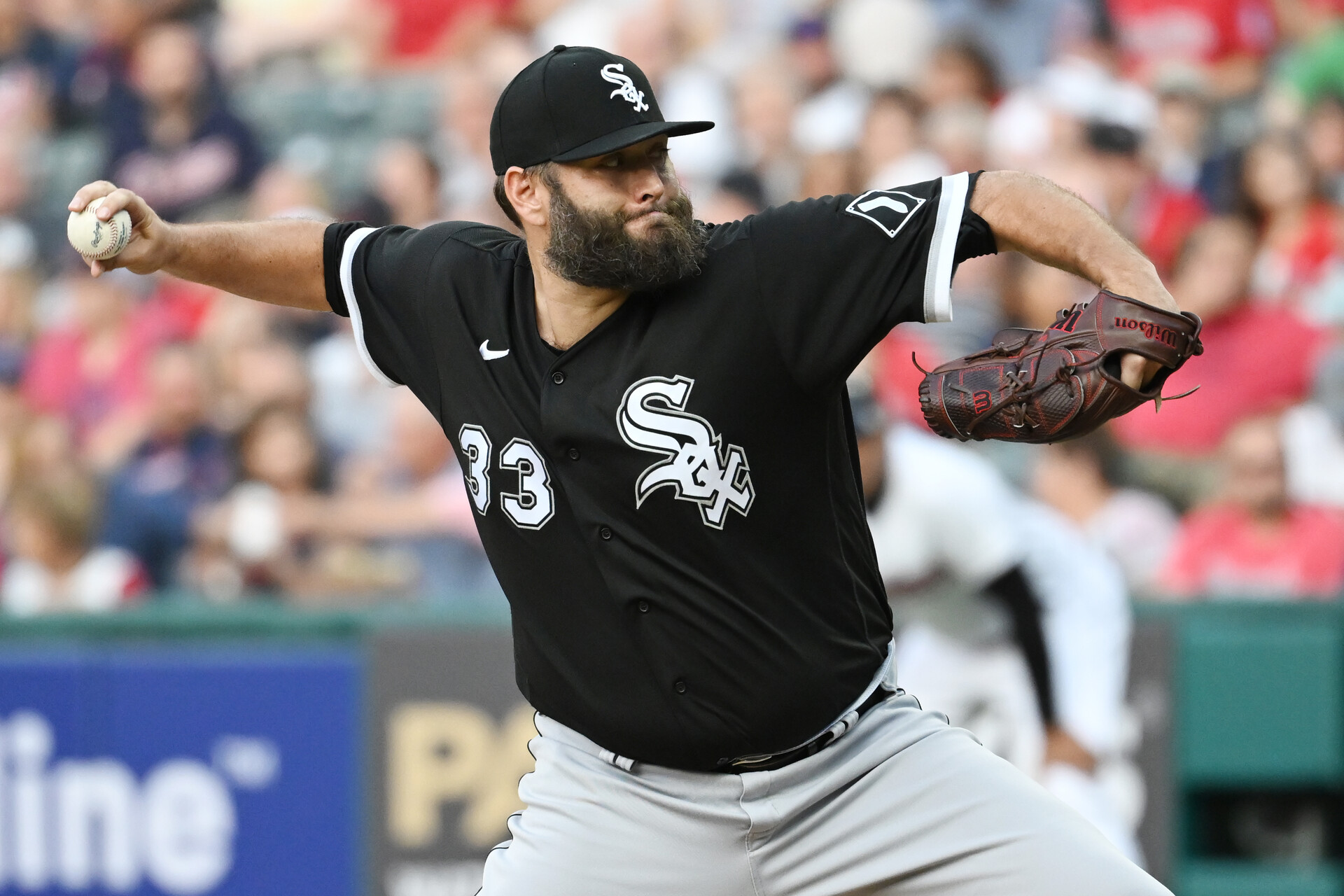 Aug 19, 2022; Cleveland, Ohio, USA; Chicago White Sox starting pitcher Lance Lynn (33) throws a pitch during the first inning against the Cleveland Guardians at Progressive Field.
