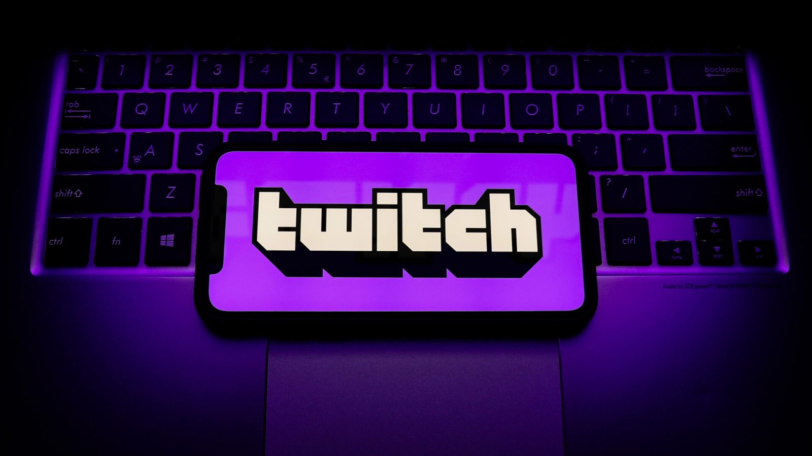 Twitch logo is seen displayed on a phone screen in this illustration photo taken in Krakow, Poland on April 30, 2021. (