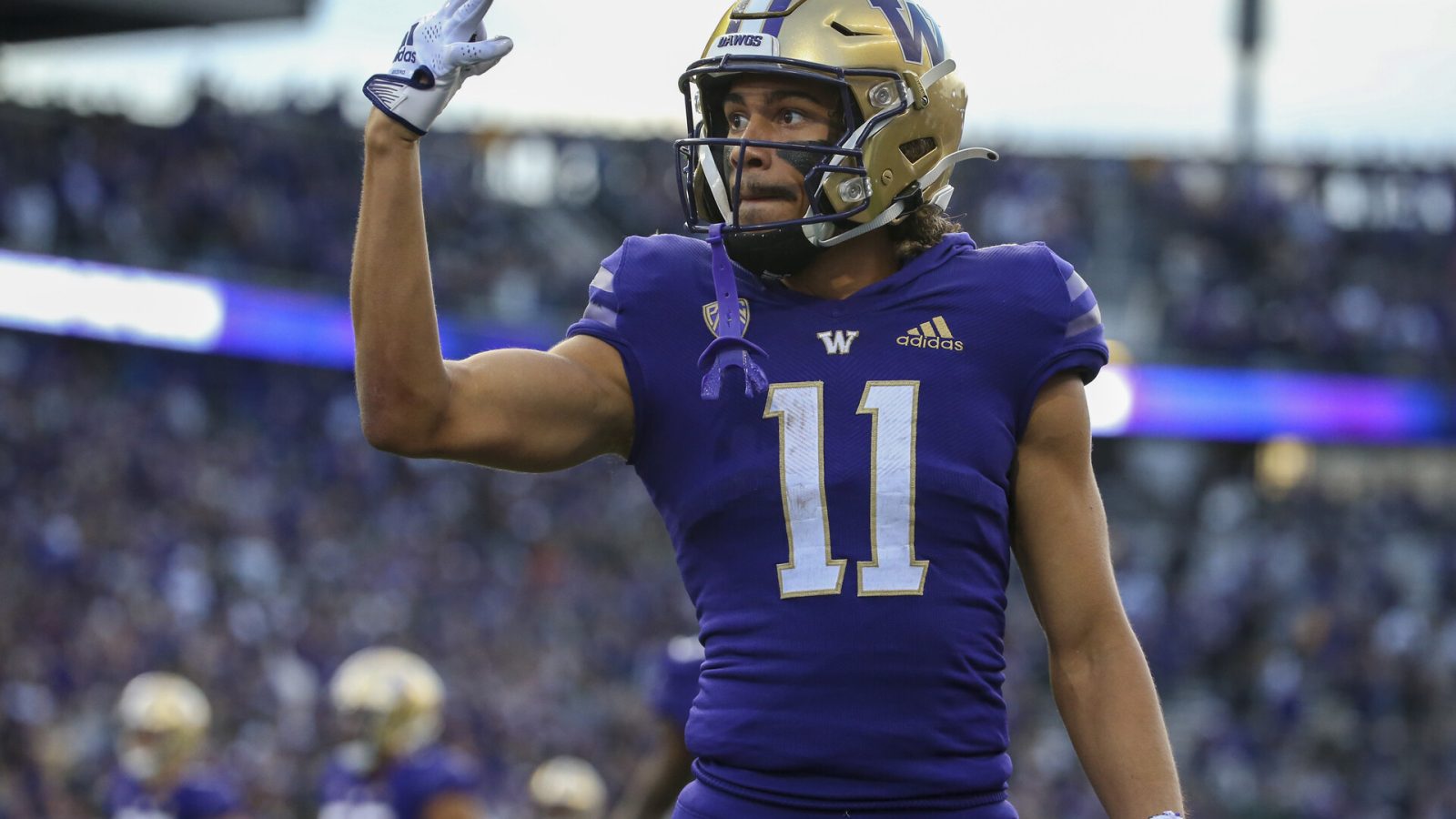 Washington Huskies wide receiver Jalen McMillan (11) celebrates Washington Huskies wide receiver Ja'Lynn Polk (2) touchdown during a college football game between the Michigan State Spartans and the Washington Huskies on September 17, 2022, at Husky Stadium in Seattle, WA.