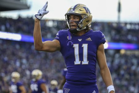 Washington Huskies wide receiver Jalen McMillan (11) celebrates Washington Huskies wide receiver Ja'Lynn Polk (2) touchdown during a college football game between the Michigan State Spartans and the Washington Huskies on September 17, 2022, at Husky Stadium in Seattle, WA.