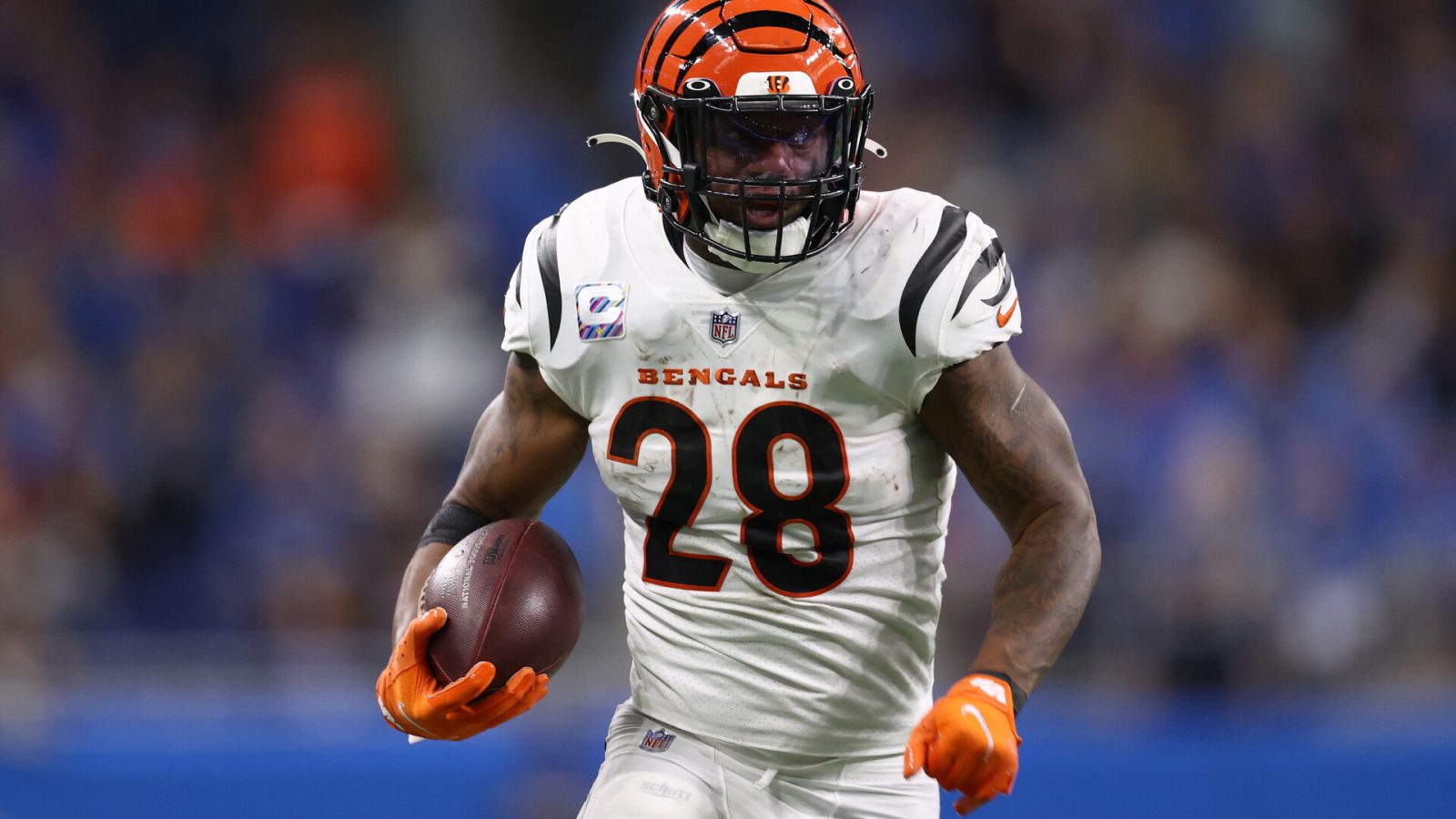 Joe Mixon #28 of the Cincinnati Bengals during a run after a catch against the Detroit Lions at Ford Field on October 17, 2021 in Detroit, Michigan.