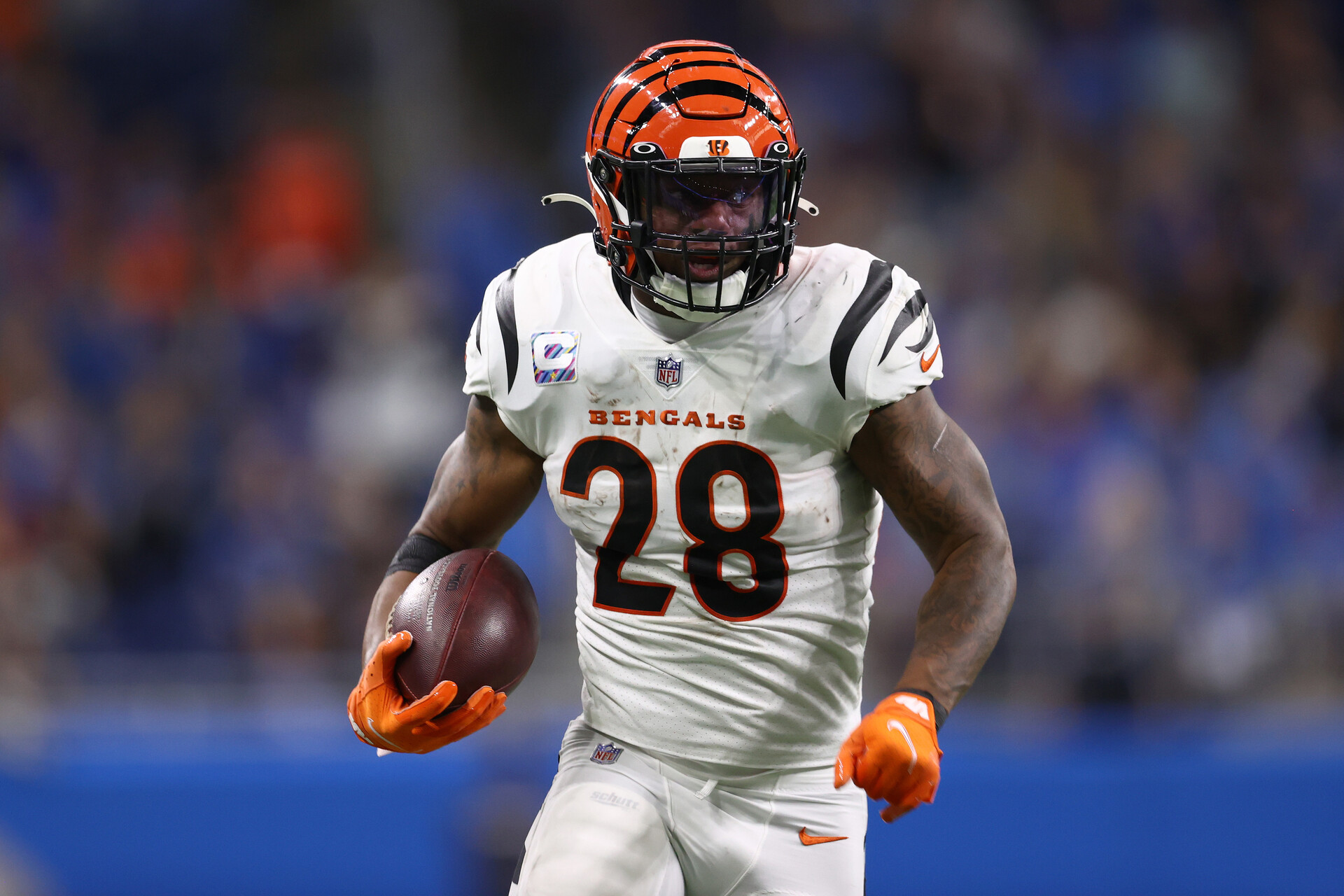 Joe Mixon #28 of the Cincinnati Bengals during a run after a catch against the Detroit Lions at Ford Field on October 17, 2021 in Detroit, Michigan.