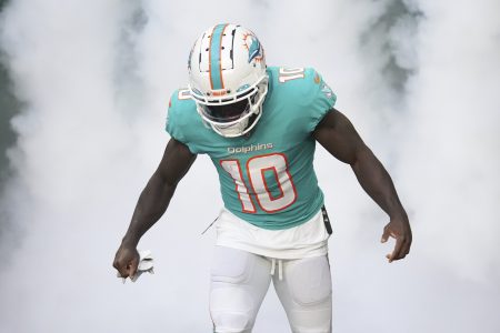 Tyreek Hill #10 of the Miami Dolphins takes the field prior to the preseason game against the Philadelphia Eagles at Hard Rock Stadium on August 27, 2022 in Miami Gardens, Florida.