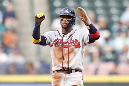 Ronald Acuna Jr. #13 of the Atlanta Braves reacts after stealing second base during the first inning against the Seattle Mariners at T-Mobile Park on September 09, 2022 in Seattle, Washington.