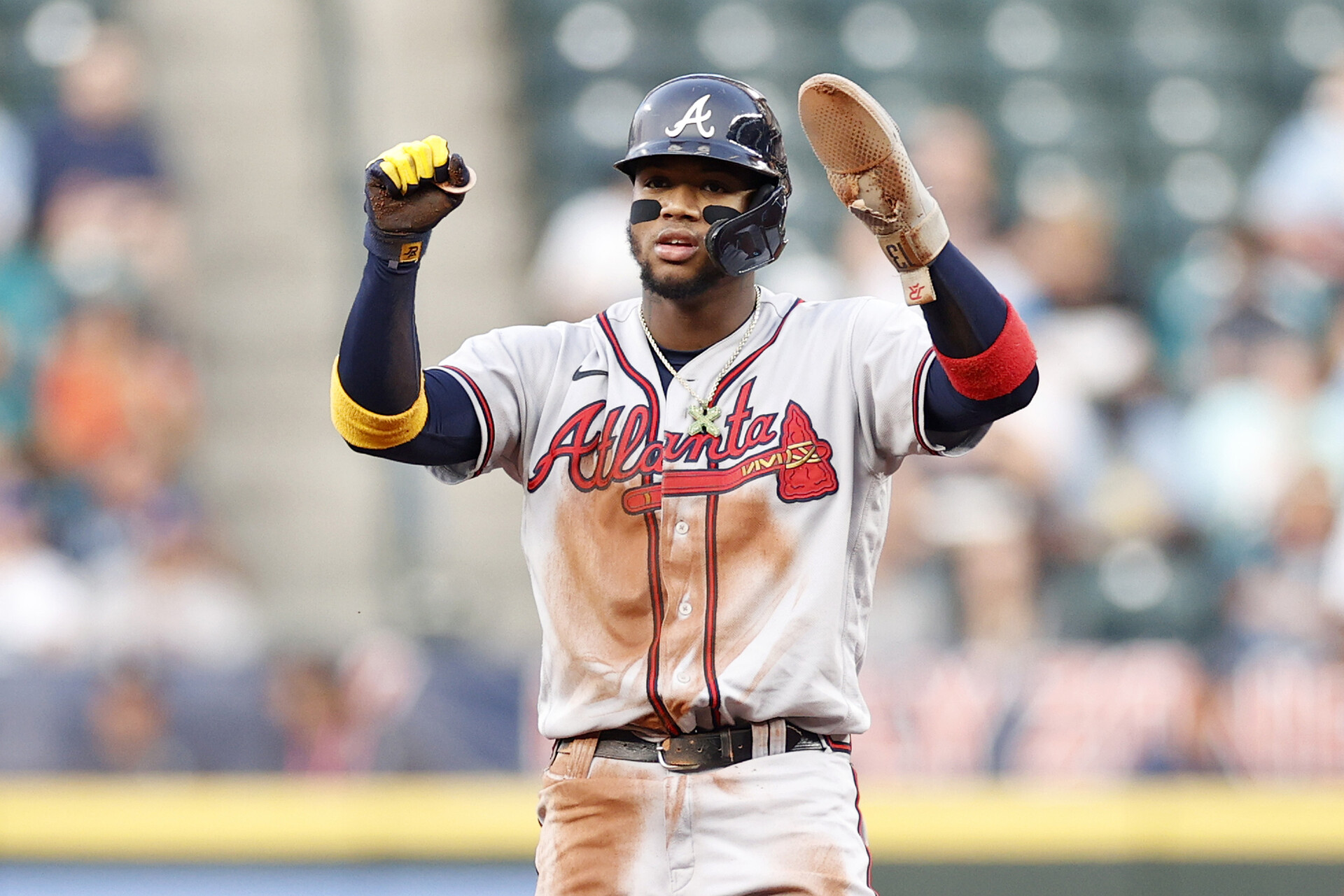 Ronald Acuna Jr. #13 of the Atlanta Braves reacts after stealing second base during the first inning against the Seattle Mariners at T-Mobile Park on September 09, 2022 in Seattle, Washington.