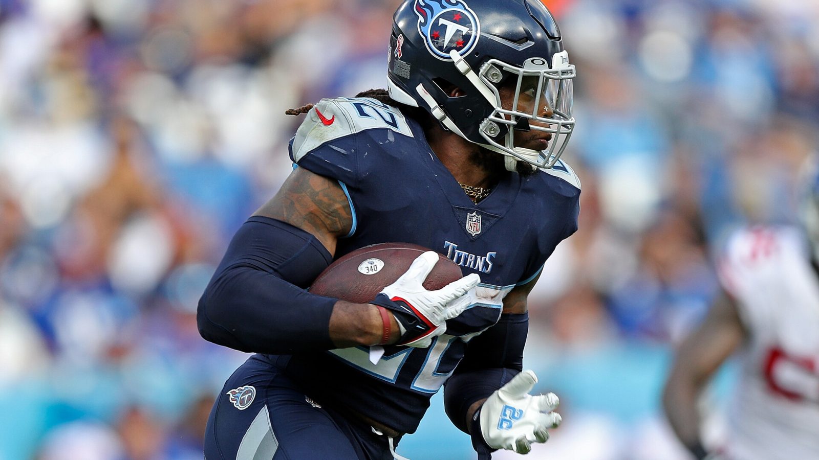 Derrick Henry #22 of the Tennessee Titans carries the ball during the game against the New York Giants at Nissan Stadium on September 11, 2022 in Nashville, Tennessee.