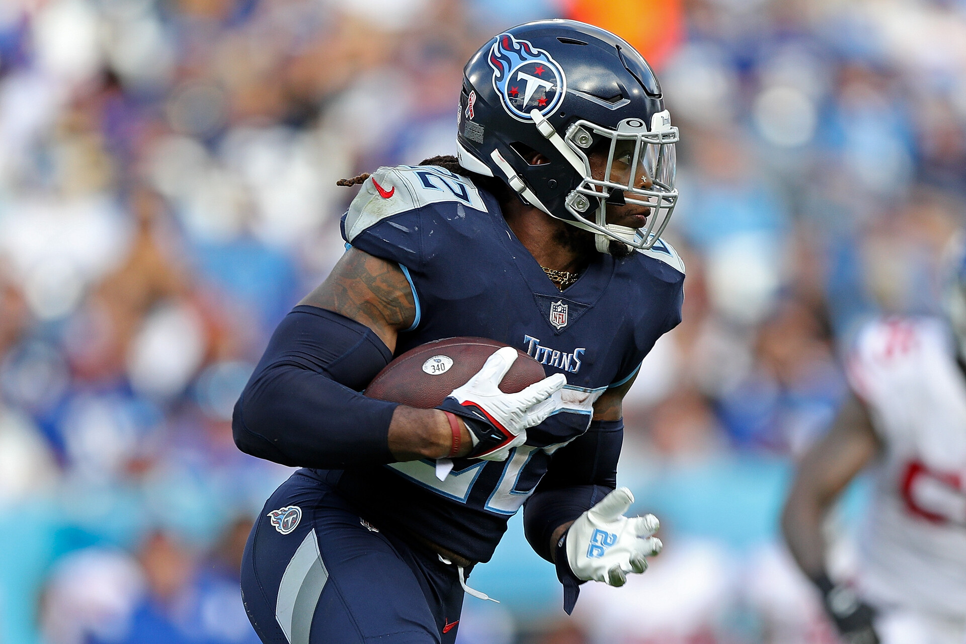 Derrick Henry #22 of the Tennessee Titans carries the ball during the game against the New York Giants at Nissan Stadium on September 11, 2022 in Nashville, Tennessee.