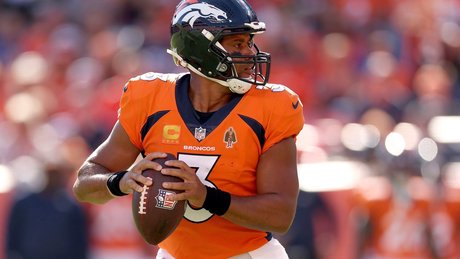 Russell Wilson #3 of the Denver Broncos plays the Houston Texans at Empower Field At Mile High on September 18, 2022 in Denver, Colorado.