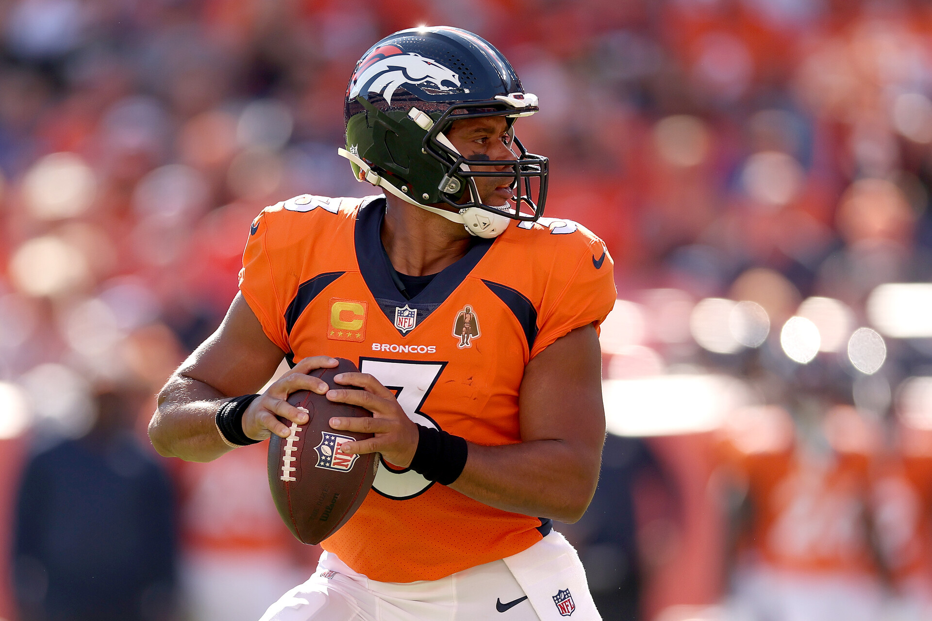Russell Wilson #3 of the Denver Broncos plays the Houston Texans at Empower Field At Mile High on September 18, 2022 in Denver, Colorado.
