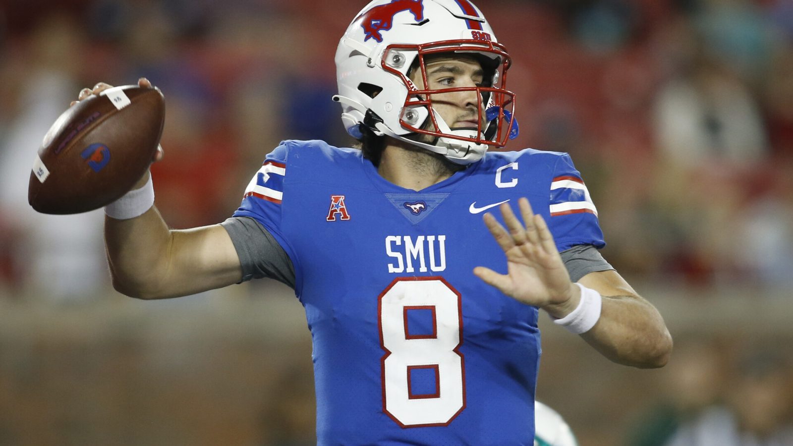 Southern Methodist Mustangs quarterback Tanner Mordecai (8) throws a pass in the third quarter against the Tulane Green Wave at Gerald J. Ford Stadium.