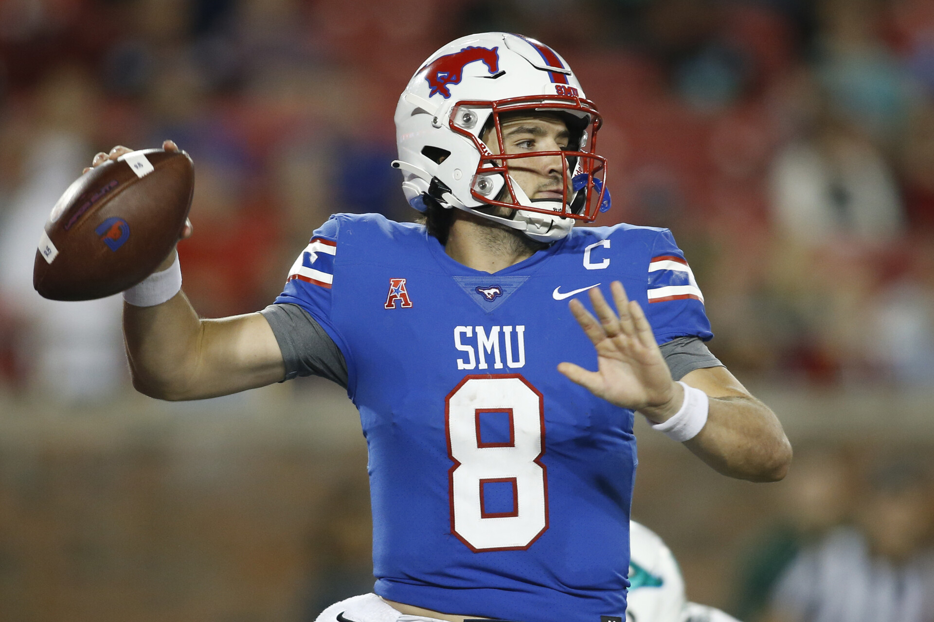 Southern Methodist Mustangs quarterback Tanner Mordecai (8) throws a pass in the third quarter against the Tulane Green Wave at Gerald J. Ford Stadium.