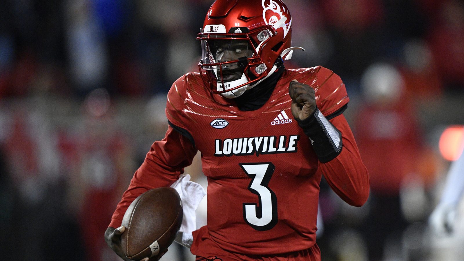 Louisville Cardinals quarterback Malik Cunningham (3) runs the ball against the Kentucky Wildcats during the second quarter at Cardinal Stadium. Kentucky won 52-21.
