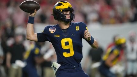 Dec 31, 2021; Miami Gardens, FL, USA; Michigan Wolverines quarterback J.J. McCarthy (9) throws against the Georgia Bulldogs during the fourth quarter in the Orange Bowl college football CFP national semifinal game at Hard Rock Stadium.