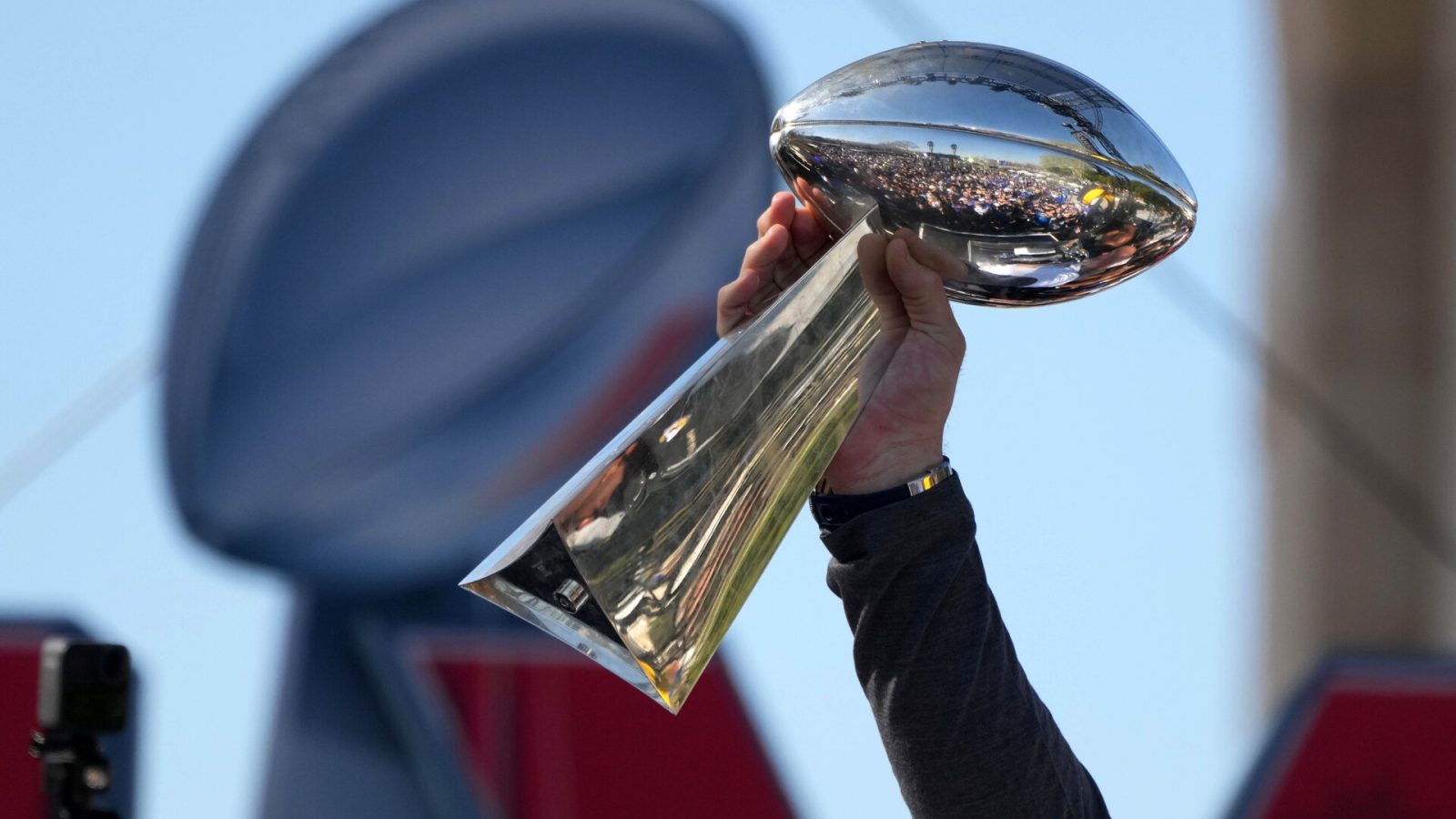 Feb 16, 2022; Los Angeles, CA, USA; Los Angeles Rams tackle Andrew Whitworth holds the Vince Lombardi trophy during the Super Bowl LVI championship rally at the Los Angeles Memorial Coliseum.