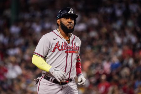 Atlanta Braves designated hitter Marcell Ozuna (20) hits a three run home run against the Boston Red Sox in the fourth inning at Fenway Park.