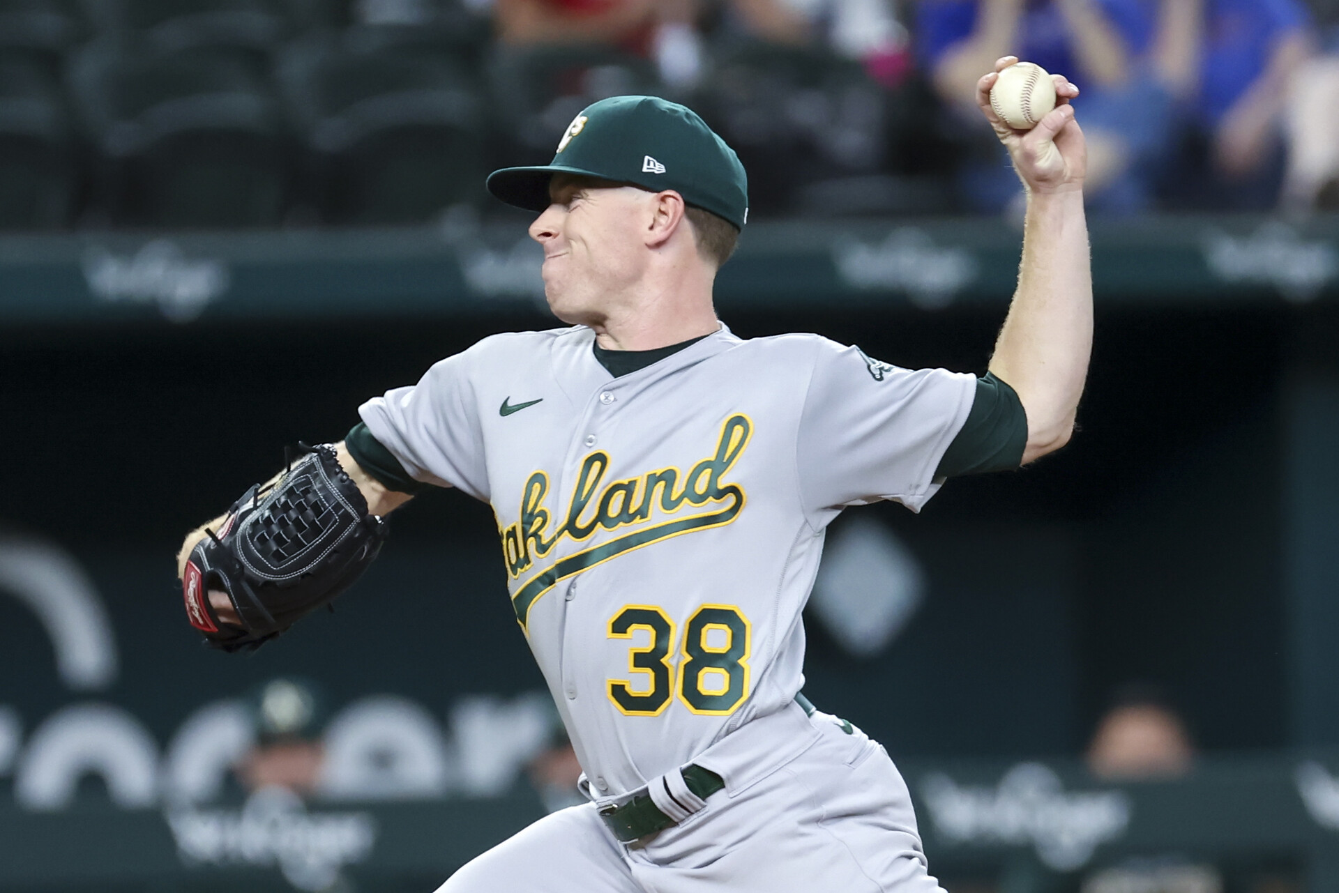 Aug 16, 2022; Arlington, Texas, USA; Oakland Athletics starting pitcher JP Sears (38) throws during the first inning against the Texas Rangers at Globe Life Field.