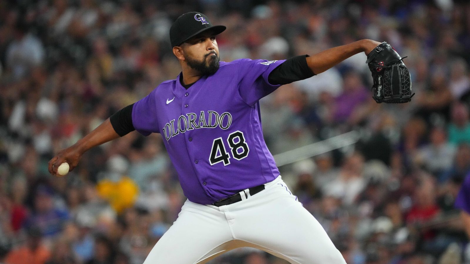Aug 23, 2022; Denver, Colorado, USA; Colorado Rockies starting pitcher German Marquez (48) pitches in the fifth inning against the Texas Rangers at Coors Field.