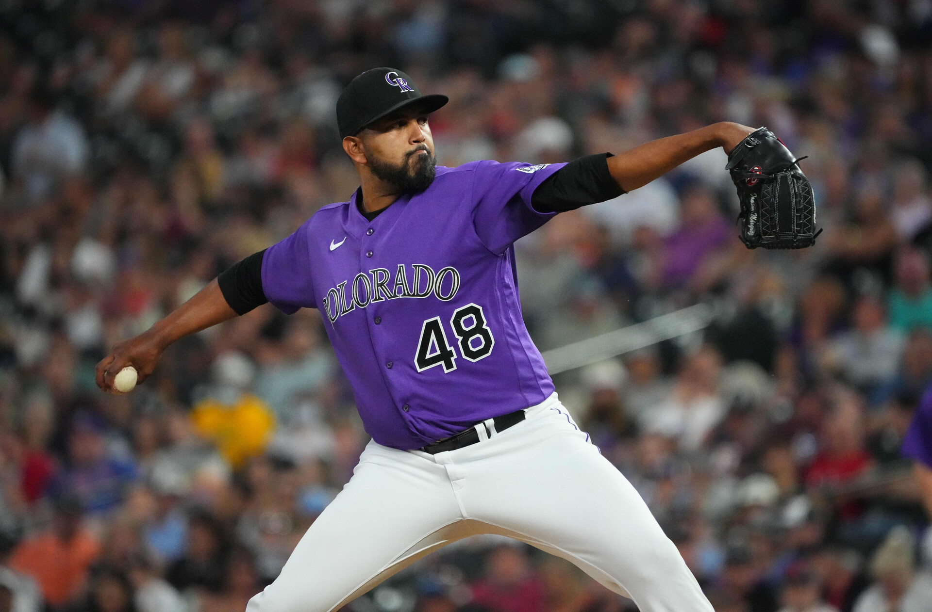 Aug 23, 2022; Denver, Colorado, USA; Colorado Rockies starting pitcher German Marquez (48) pitches in the fifth inning against the Texas Rangers at Coors Field.