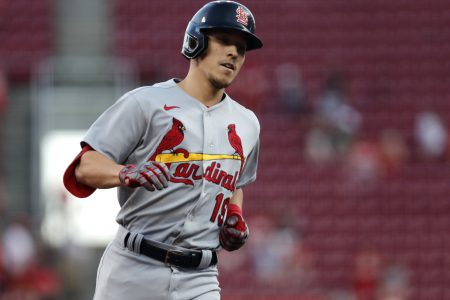 Aug 30, 2022; Cincinnati, Ohio, USA; St. Louis Cardinals shortstop Tommy Edman (19) runs the bases after hitting a solo home run against the Cincinnati Reds during the third inning at Great American Ball Park