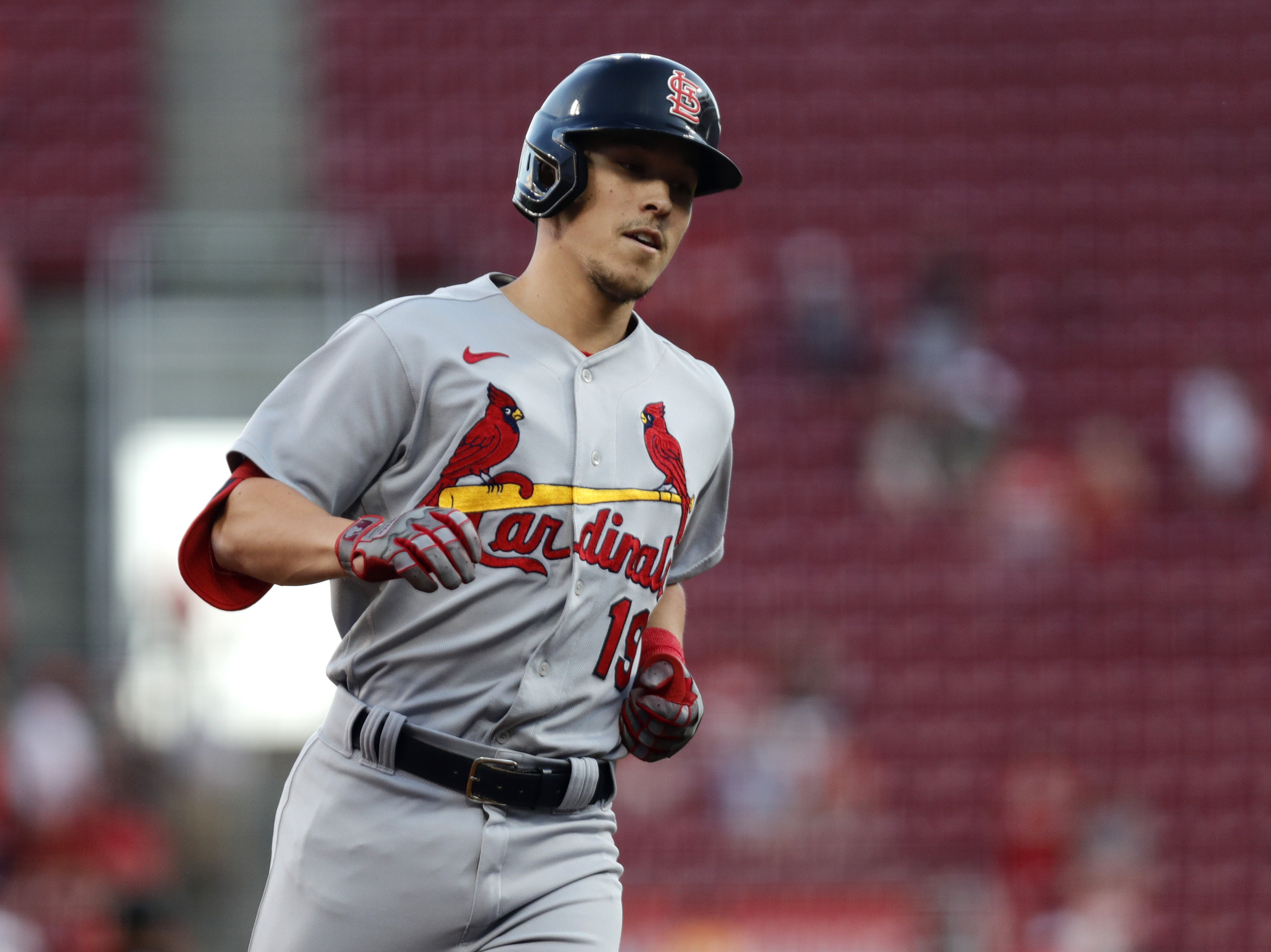 Aug 30, 2022; Cincinnati, Ohio, USA; St. Louis Cardinals shortstop Tommy Edman (19) runs the bases after hitting a solo home run against the Cincinnati Reds during the third inning at Great American Ball Park
