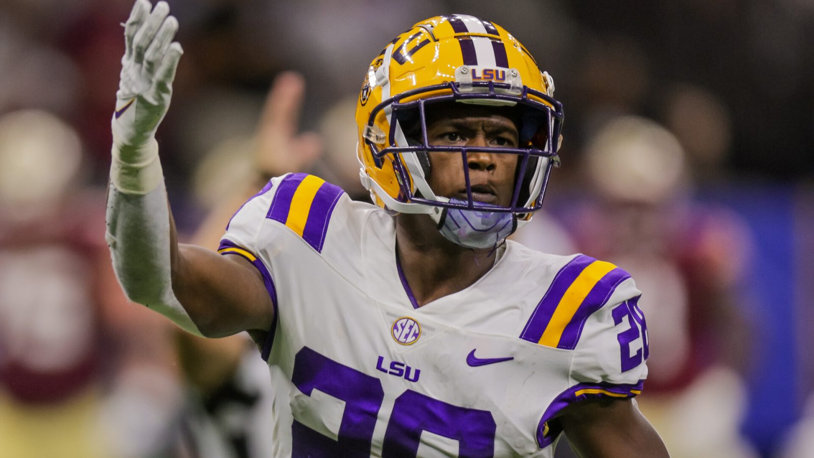 Sep 4, 2022; New Orleans, Louisiana, USA; LSU Tigers safety Major Burns (28) reacts to a play against then Florida State Seminoles during the first half of the game at Caesars Superdome.