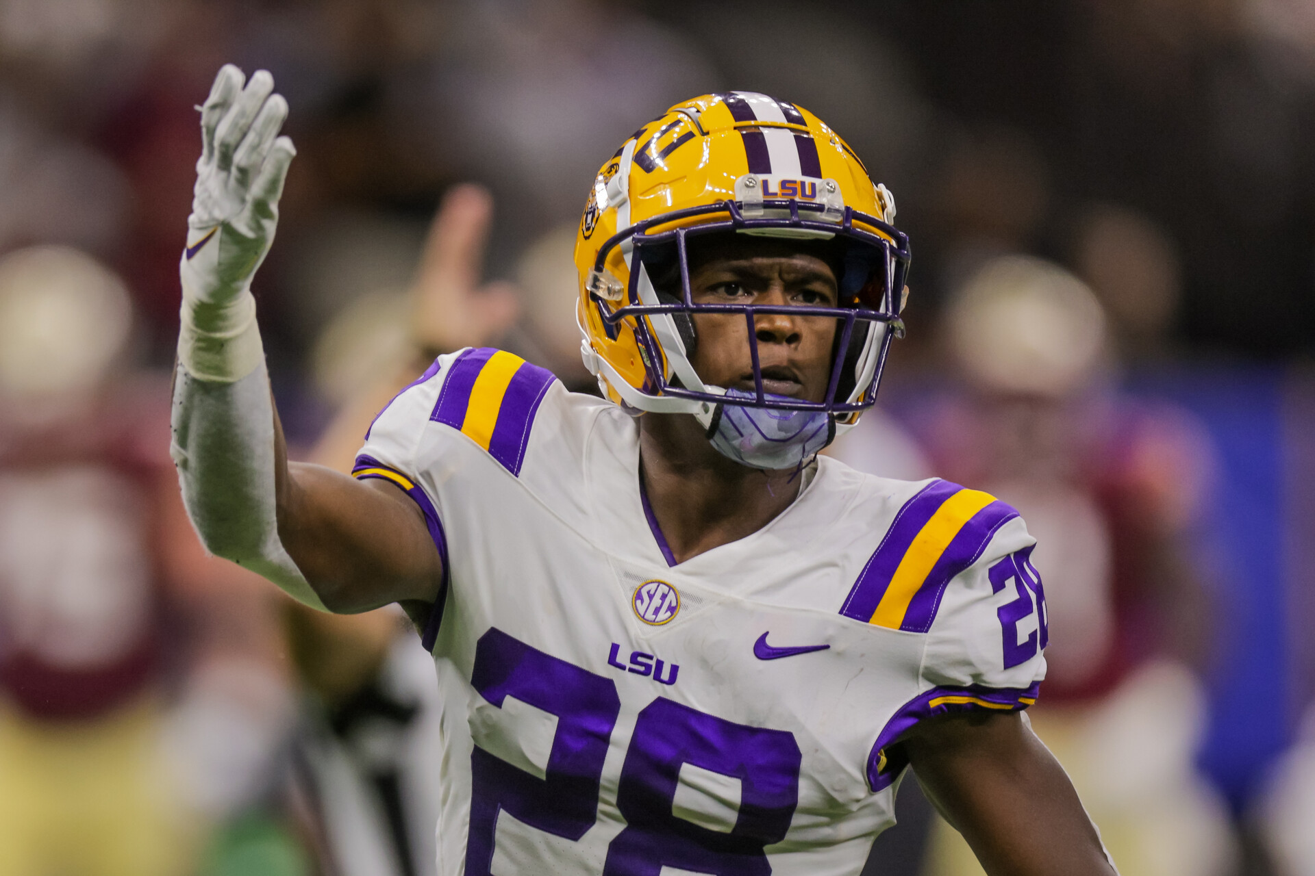 Sep 4, 2022; New Orleans, Louisiana, USA; LSU Tigers safety Major Burns (28) reacts to a play against then Florida State Seminoles during the first half of the game at Caesars Superdome.