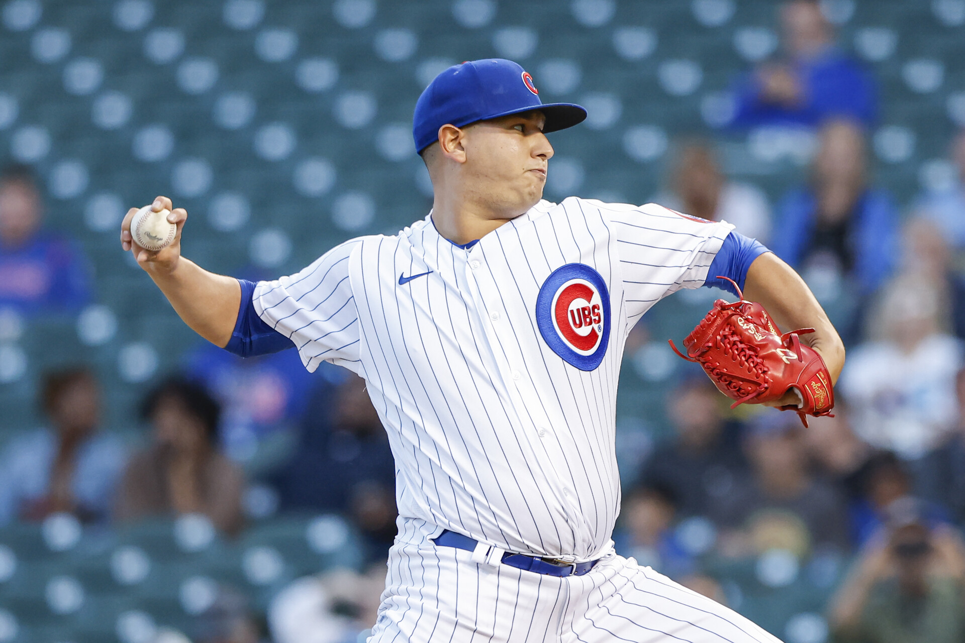 Sep 7, 2022; Chicago, Illinois, USA; Chicago Cubs starting pitcher Javier Assad (72) delivers against the Cincinnati Reds during the first inning at Wrigley Field.