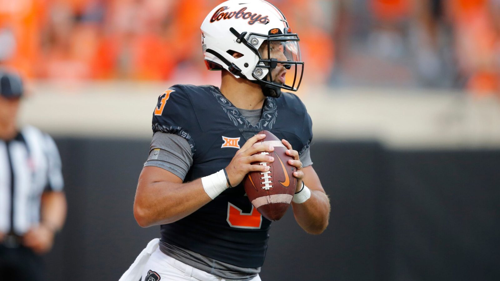 Oklahoma State's Spencer Sanders (3) drops back to pass during a college football game between the Oklahoma State Cowboys (OSU) and the Arizona State Sun Devils at Boone Pickens Stadium in Stillwater, Okla., Saturday, Sept. 10, 2022. Oklahoma State won 34-17 Osu Vs Asu