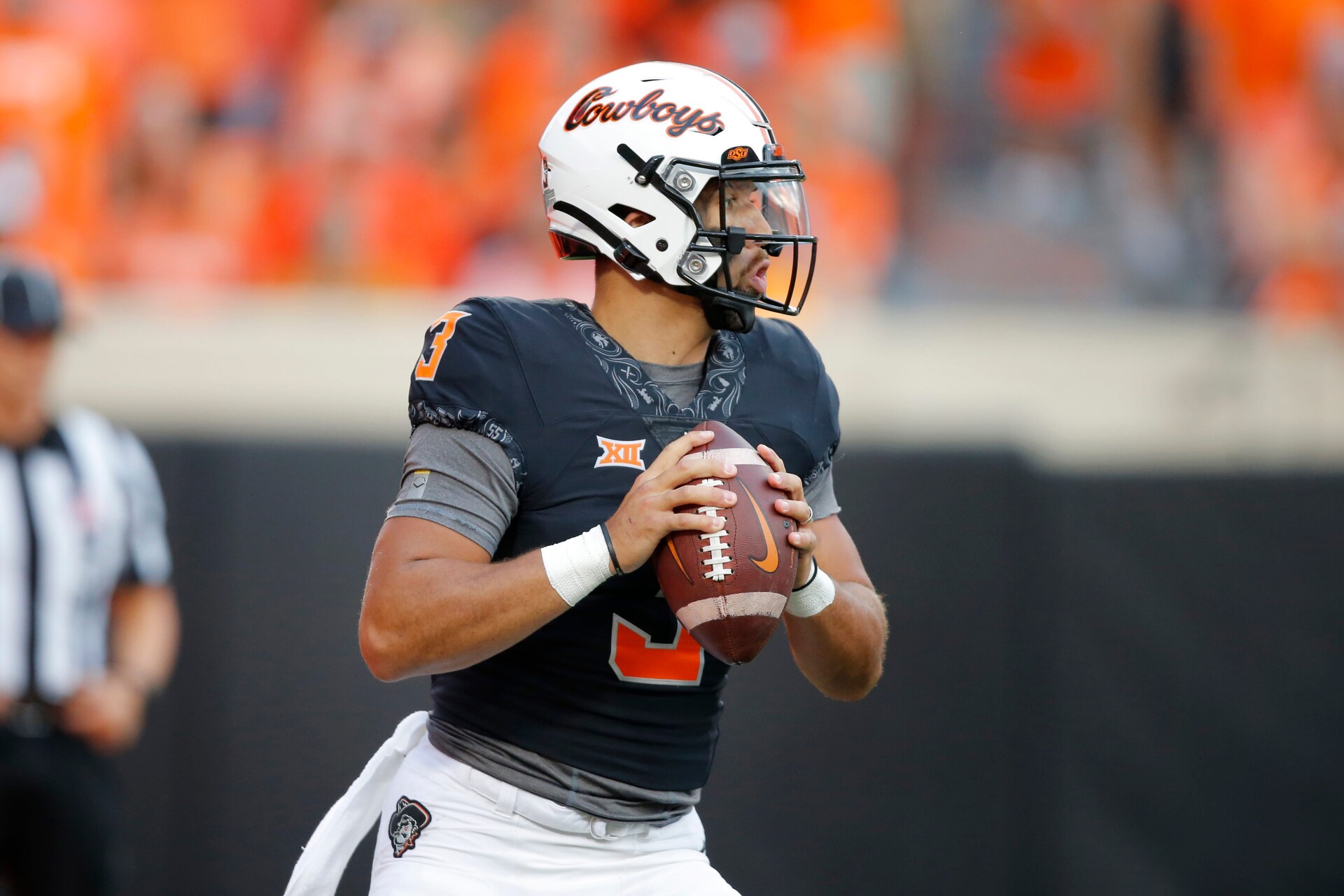 Oklahoma State's Spencer Sanders (3) drops back to pass during a college football game between the Oklahoma State Cowboys (OSU) and the Arizona State Sun Devils at Boone Pickens Stadium in Stillwater, Okla., Saturday, Sept. 10, 2022. Oklahoma State won 34-17 Osu Vs Asu