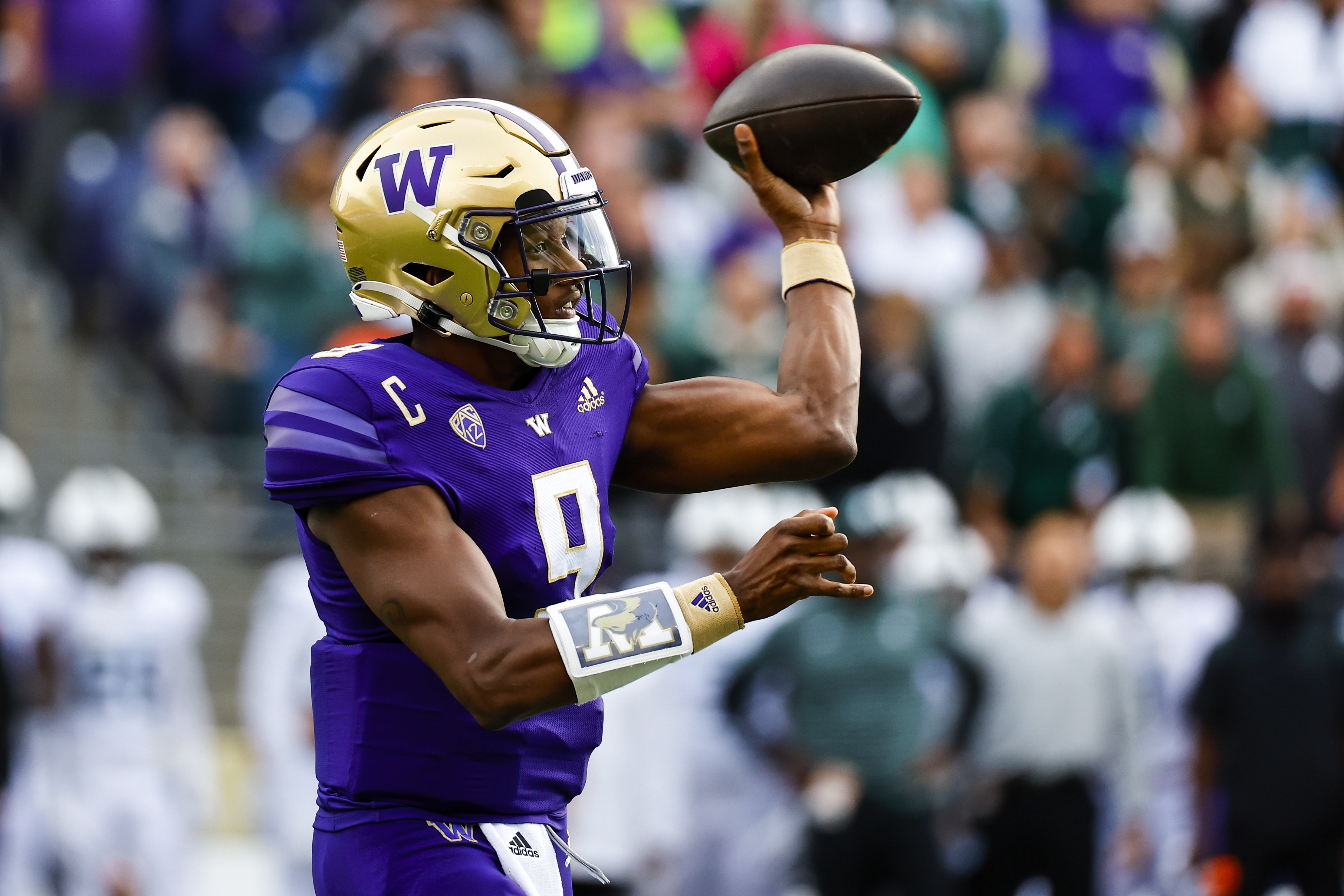 Washington Huskies quarterback Michael Penix Jr. (9) passes against the Michigan State Spartans during the first quarter at Alaska Airlines Field at Husky Stadium.