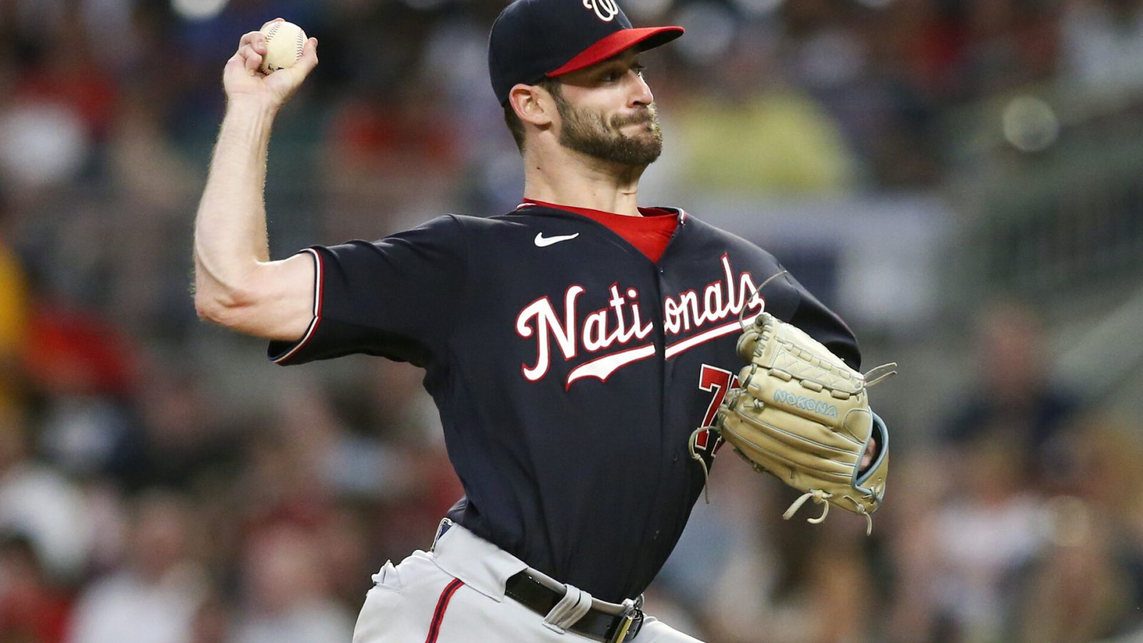 Sep 19, 2022; Atlanta, Georgia, USA; Washington Nationals starting pitcher Cory Abbott (77) throws against the Atlanta Braves in the second inning at Truist Park.