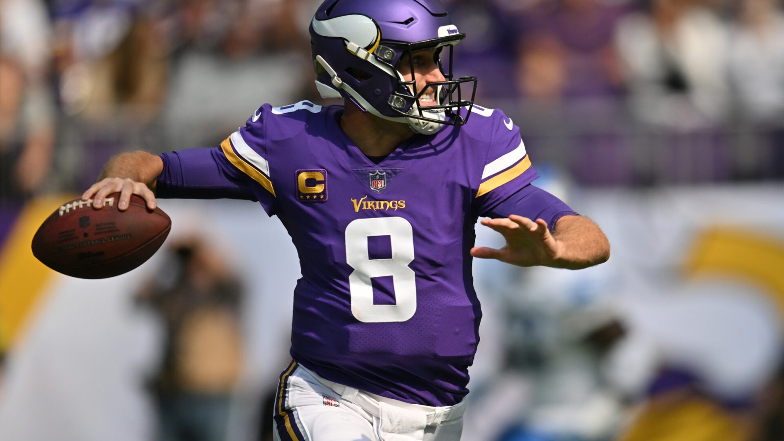 Sep 25, 2022; Minneapolis, Minnesota, USA; Minnesota Vikings quarterback Kirk Cousins (8) throws a pass against the Detroit Lions during the first quarter at U.S. Bank Stadium.