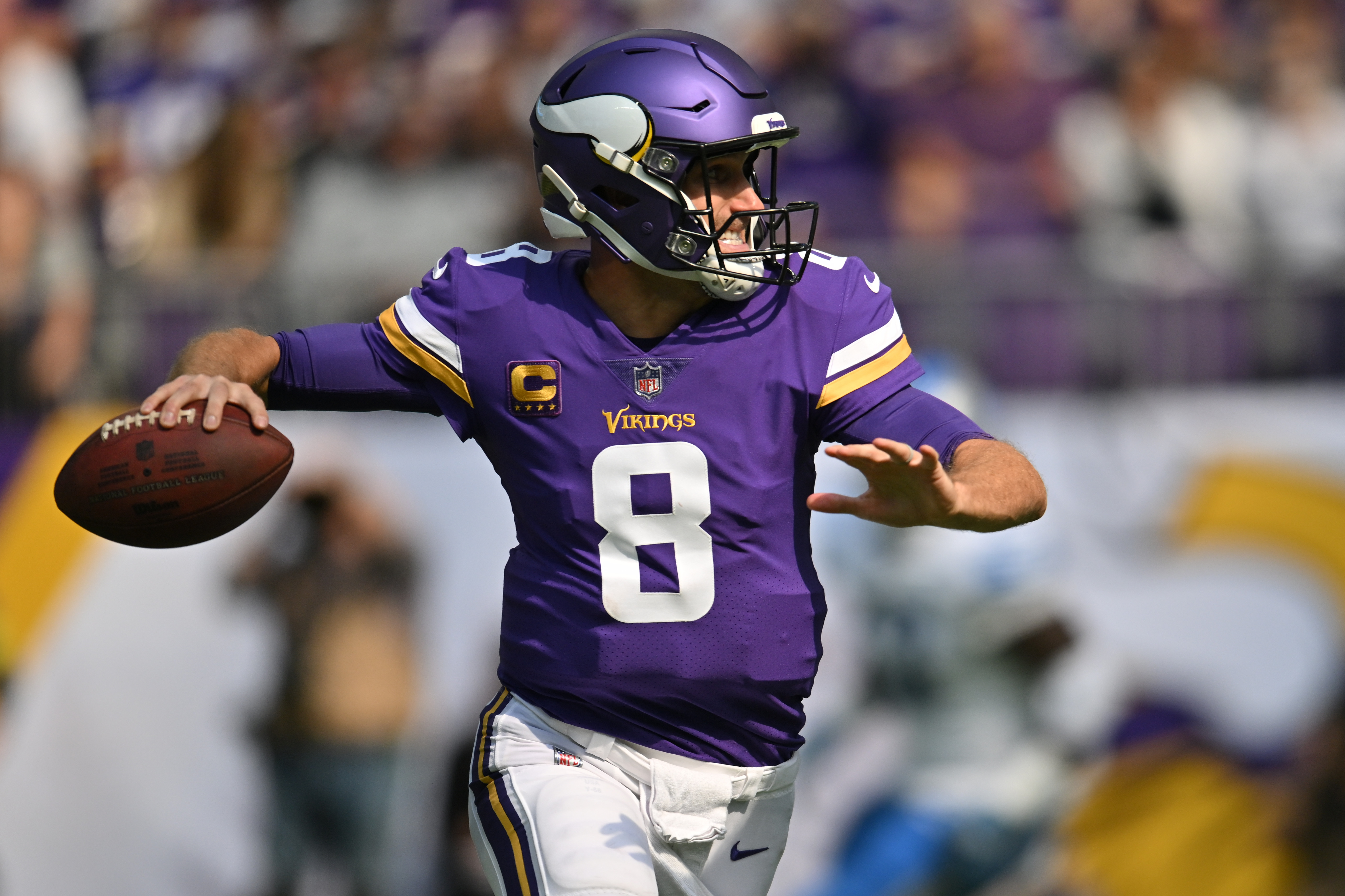 Sep 25, 2022; Minneapolis, Minnesota, USA; Minnesota Vikings quarterback Kirk Cousins (8) throws a pass against the Detroit Lions during the first quarter at U.S. Bank Stadium.