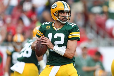 Sep 25, 2022; Tampa, Florida, USA; Green Bay Packers quarterback Aaron Rodgers (12) drops back to pass against the Tampa Bay Buccaneers in the third quarter at Raymond James Stadium
