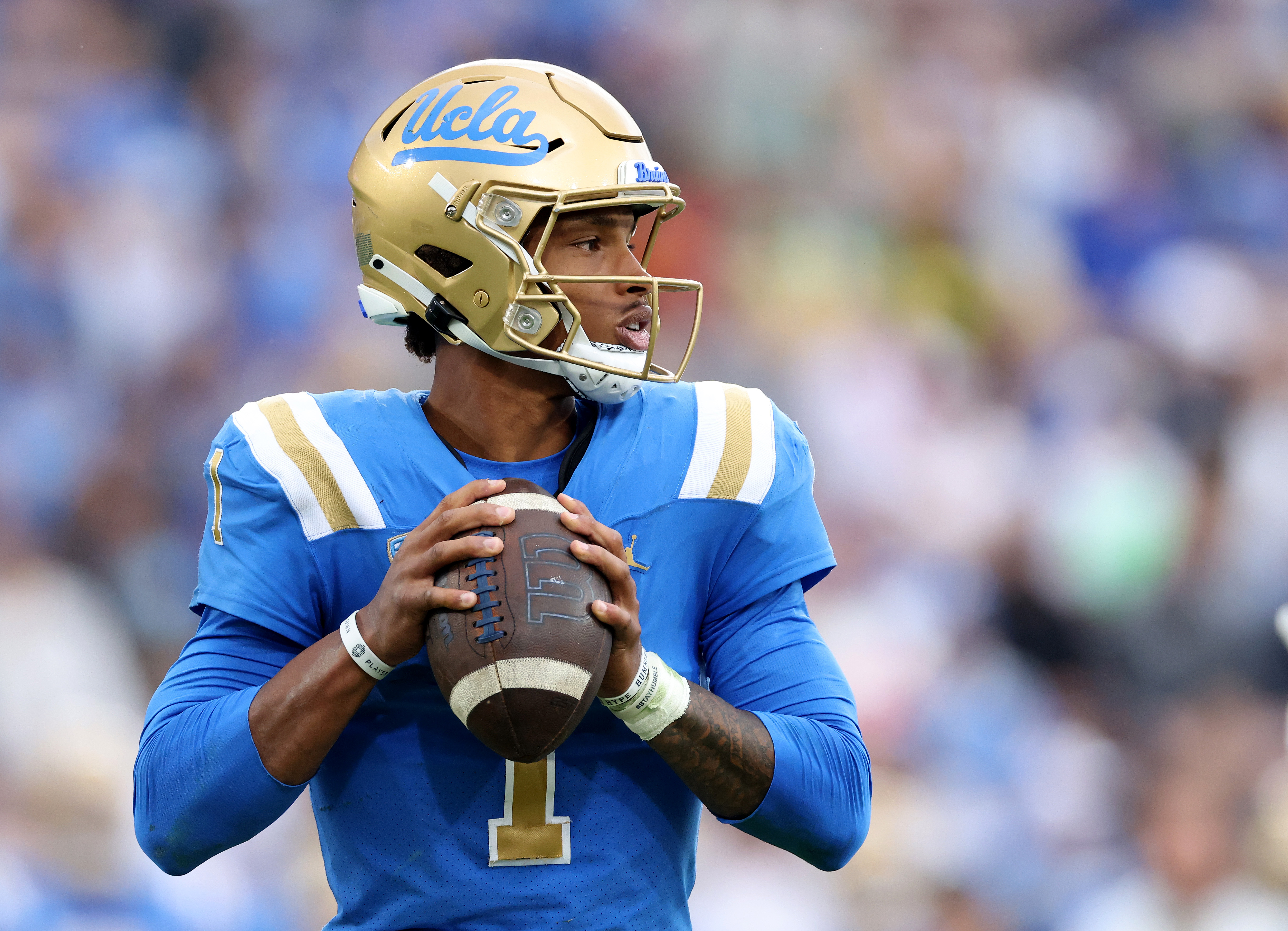 Dorian Thompson-Robinson #1 of the UCLA Bruins passes in the pocket during a 34-31 loss to the Oregon Ducks at Rose Bowl on October 23, 2021 in Pasadena, California.