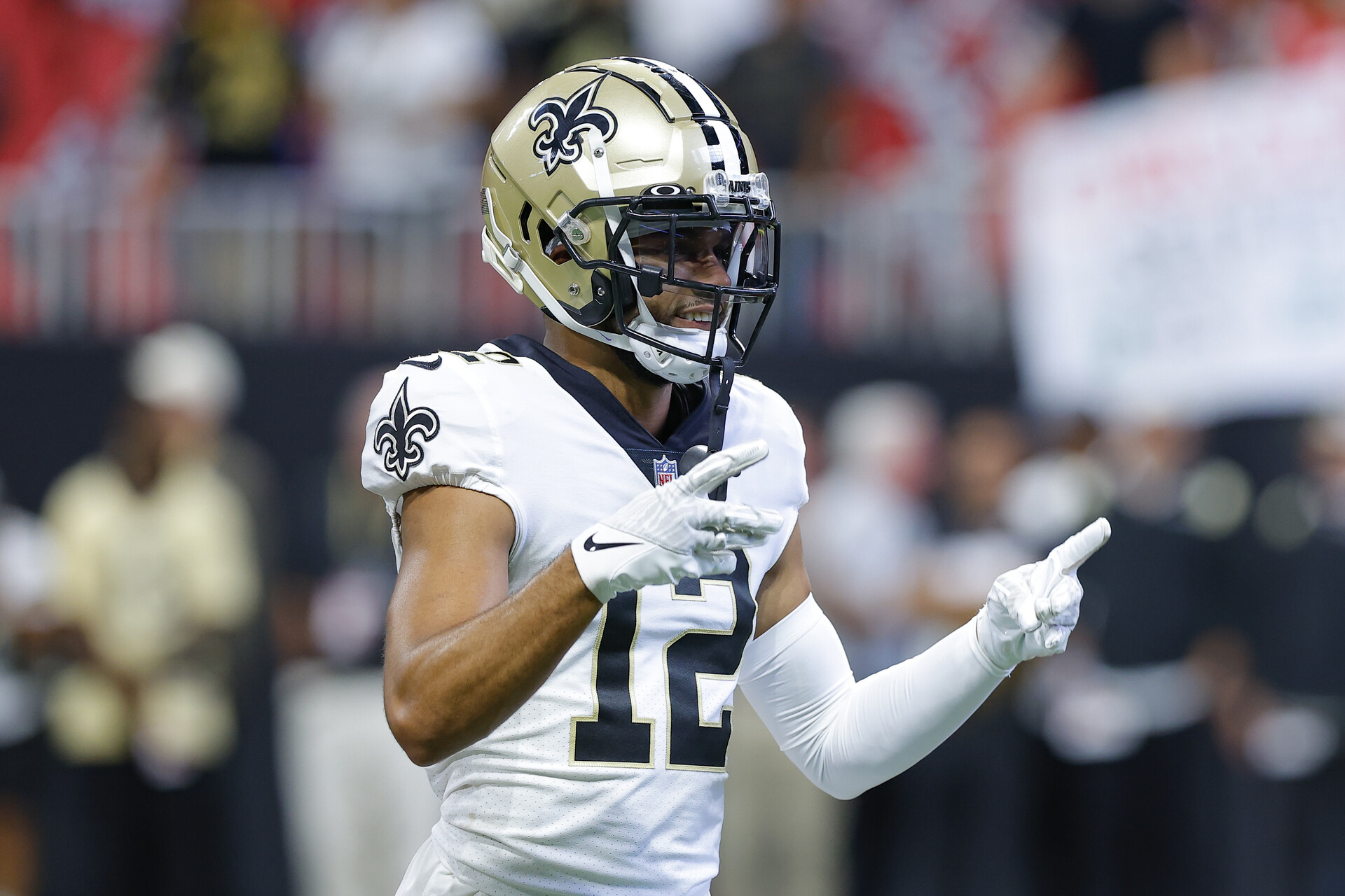 Chris Olave #12 of the New Orleans Saints warms up prior to the game against the Atlanta Falcons at Mercedes-Benz Stadium on September 11, 2022 in Atlanta, Georgia.