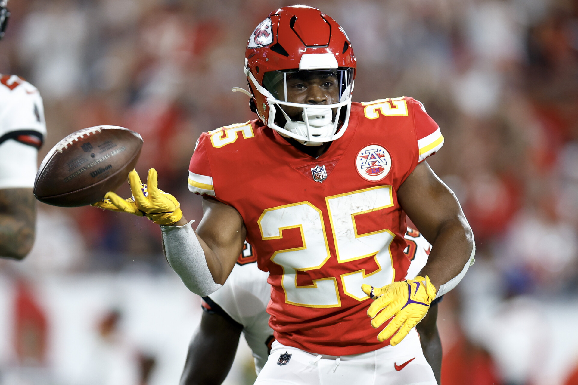 Clyde Edwards-Helaire #25 of the Kansas City Chiefs reacts against the Tampa Bay Buccaneers during the first quarter at Raymond James Stadium on October 02, 2022 in Tampa, Florida.